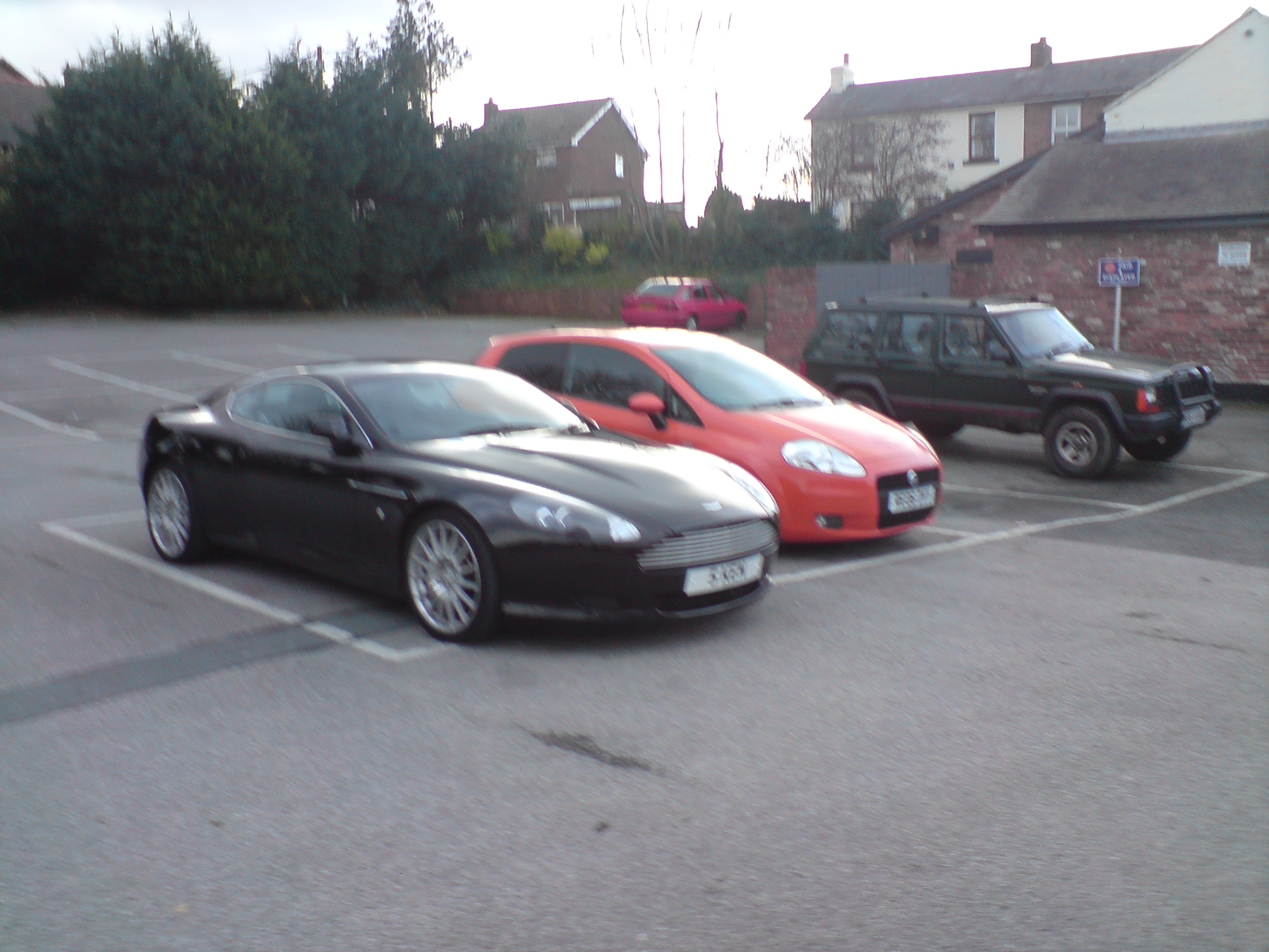 My car and Aston Martin DB9 6 litre V12